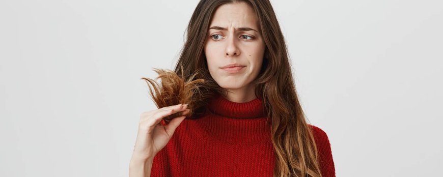 What vitamin deficiency causes hair loss and brittle nails?